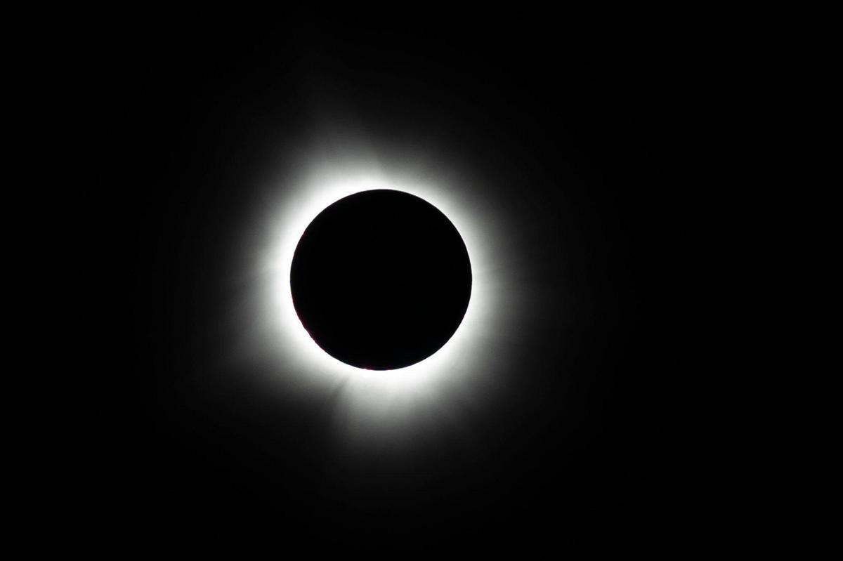 A solar eclipse is photographed in Paducah, Ky., on Monday, April 8, 2024.
