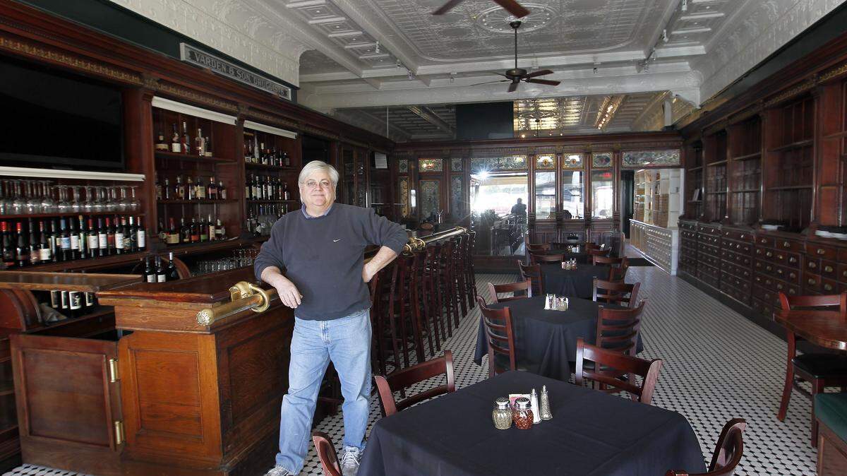 Owner Keith Clark leaned on the antique bar he added for his new Grey Goose restaurant, which will open next week in Paris. The Grey Goose already has landed in Lexington and Midway. The Paris location is the site of the former Varden's drugstore.
  