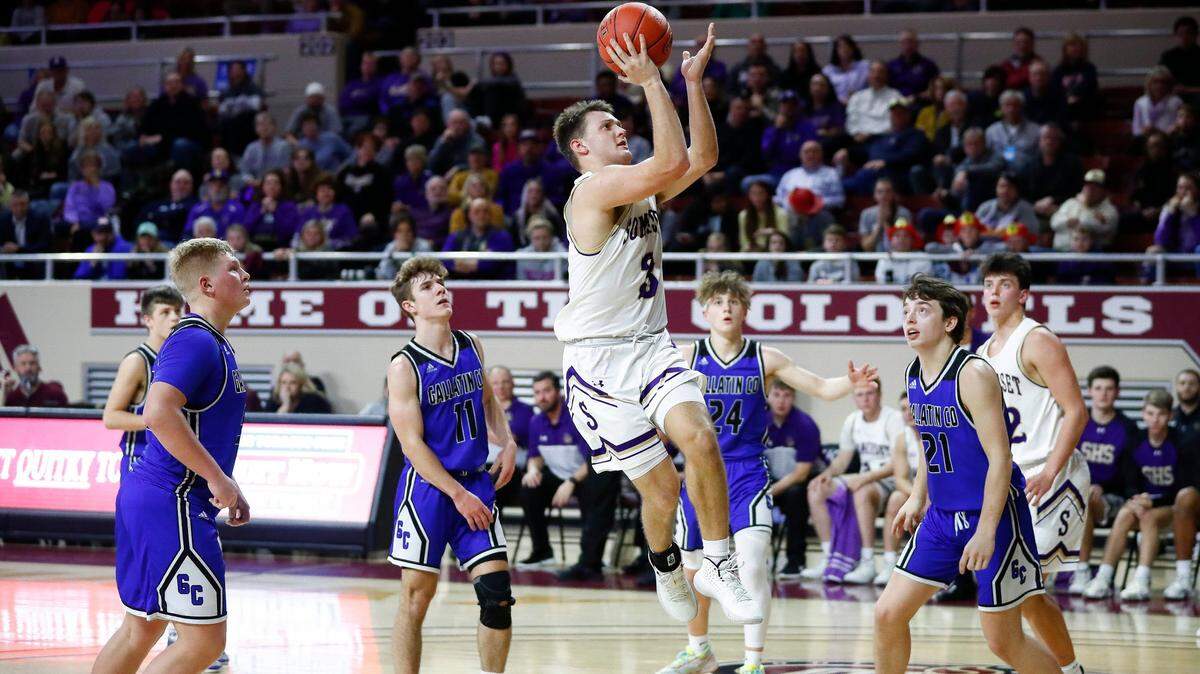 Somerset’s Kade Grundy (3) shot past Gallatin County’s Logan Riddle (55), Hayden Dickerson (11), Jarin Rassman (24) and Gage Ashcraft (21) during their All ‘A’ Classic game at Eastern Kentucky University’s McBrayer Arena in Richmond on Jan. 23, 2020. Somerset beat Gallatin County 46-37.