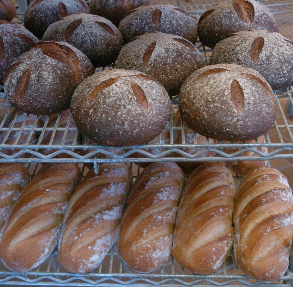 Seven grain Boule on top and Jewish Rye Batard on bottom is seen at Lexington’s Bluegrass Baking Company in this file photo. Staff photo/Janet Worne