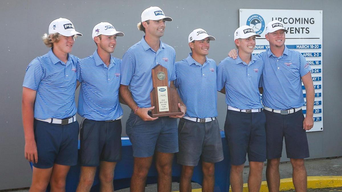 The Madison Central boys’ golf team posed with the first place team trophy after winning the Region 9 championship at Kearney Hill Golf Links in Lexington on Sept. 21. The team went on to win the state title as well.