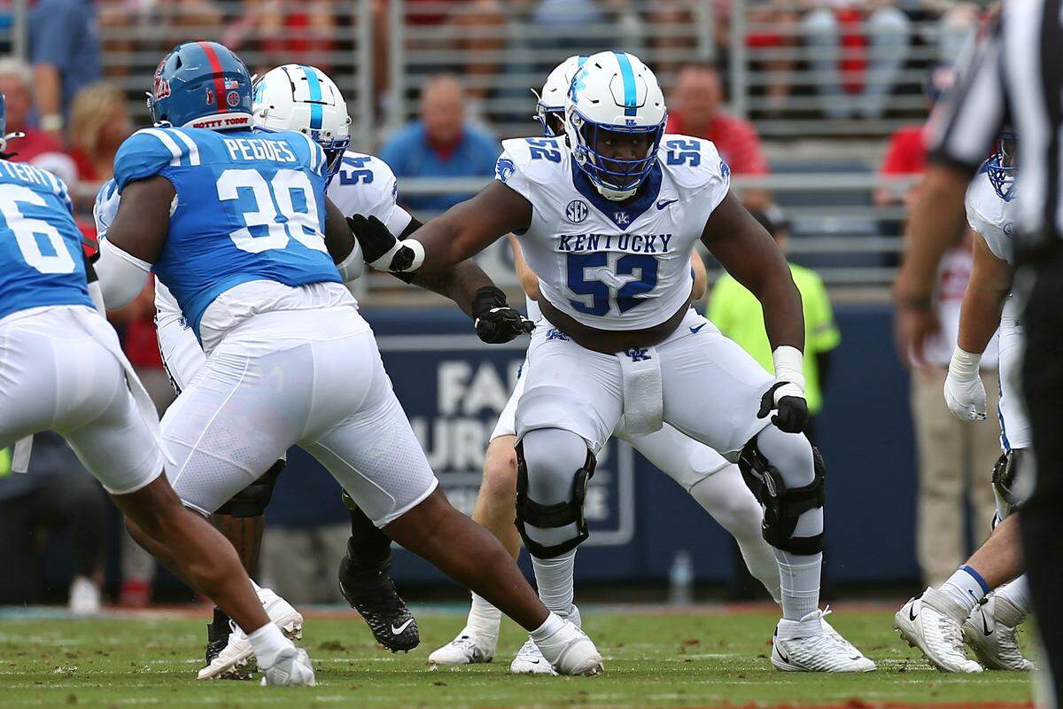 Of Kentucky right guard Jalen Farmer (52), UK coach Mark Stoops says he “brings a lot of intensity to that (offensive) line. And (he is a) great teammate and a very good leader. I like what I’m seeing (in) him.”