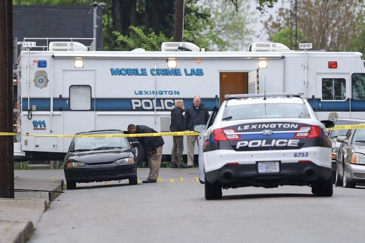 Lexington police investigated a double homicide on Race Street, where Heather Grigsby and Shannon Goodwin were found dead of gunshot wounds inside a car.