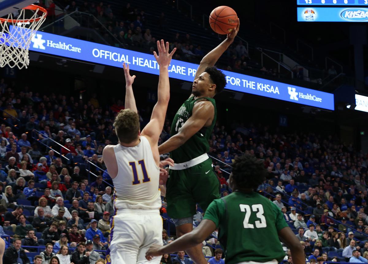 Trinity star David Johnson, with ball, was named 2019 state tournament MVP after leading the Shamrocks to their second Sweet Sixteen title since 2012.