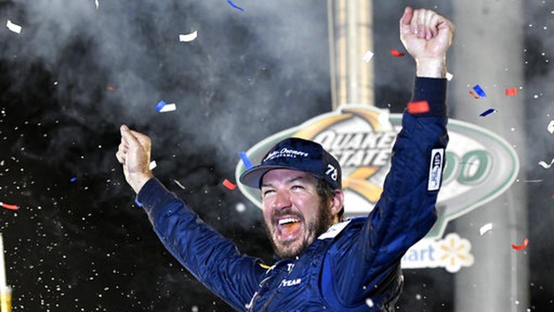Martin Truex Jr. celebrated his victory in the NASCAR Cup Series race at Kentucky Speedway on Saturday night in Sparta.