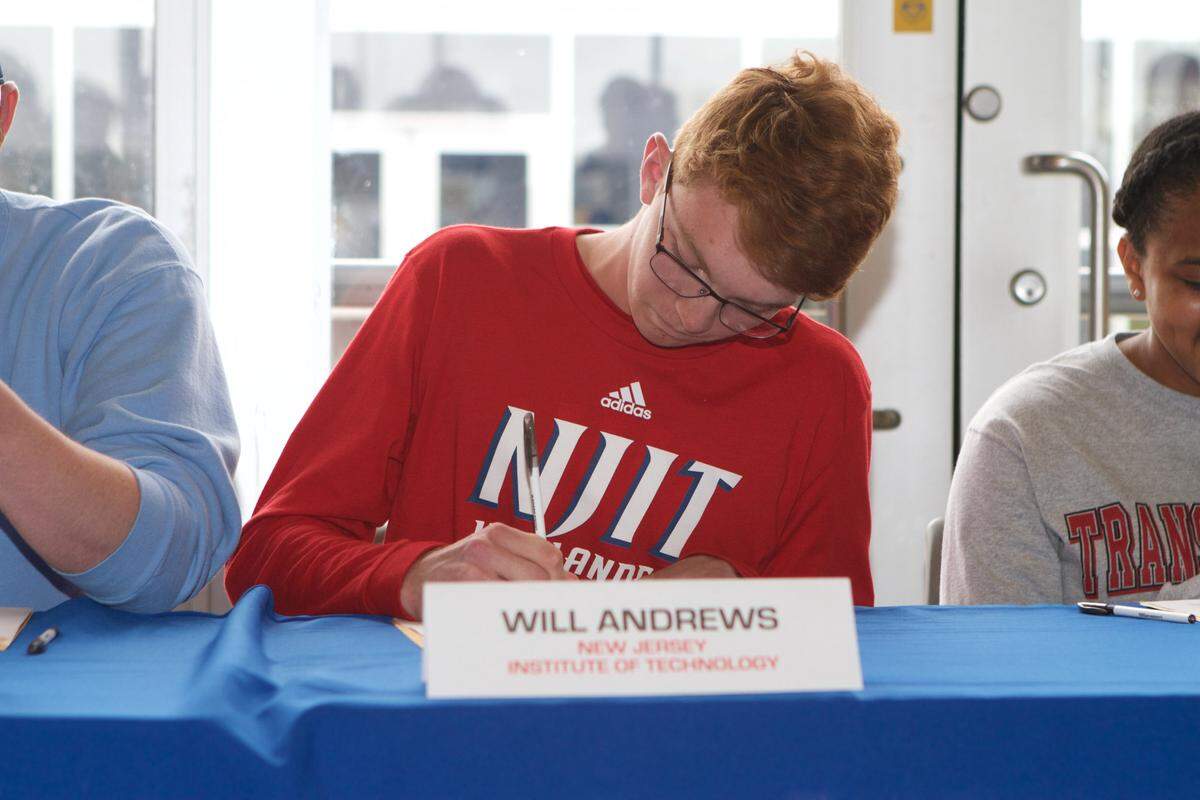 Henry Clay's Will Andrews signed his national letter of intent to play men's volleyball at New Jersey Institute of Technology as part of the school's signing day event.