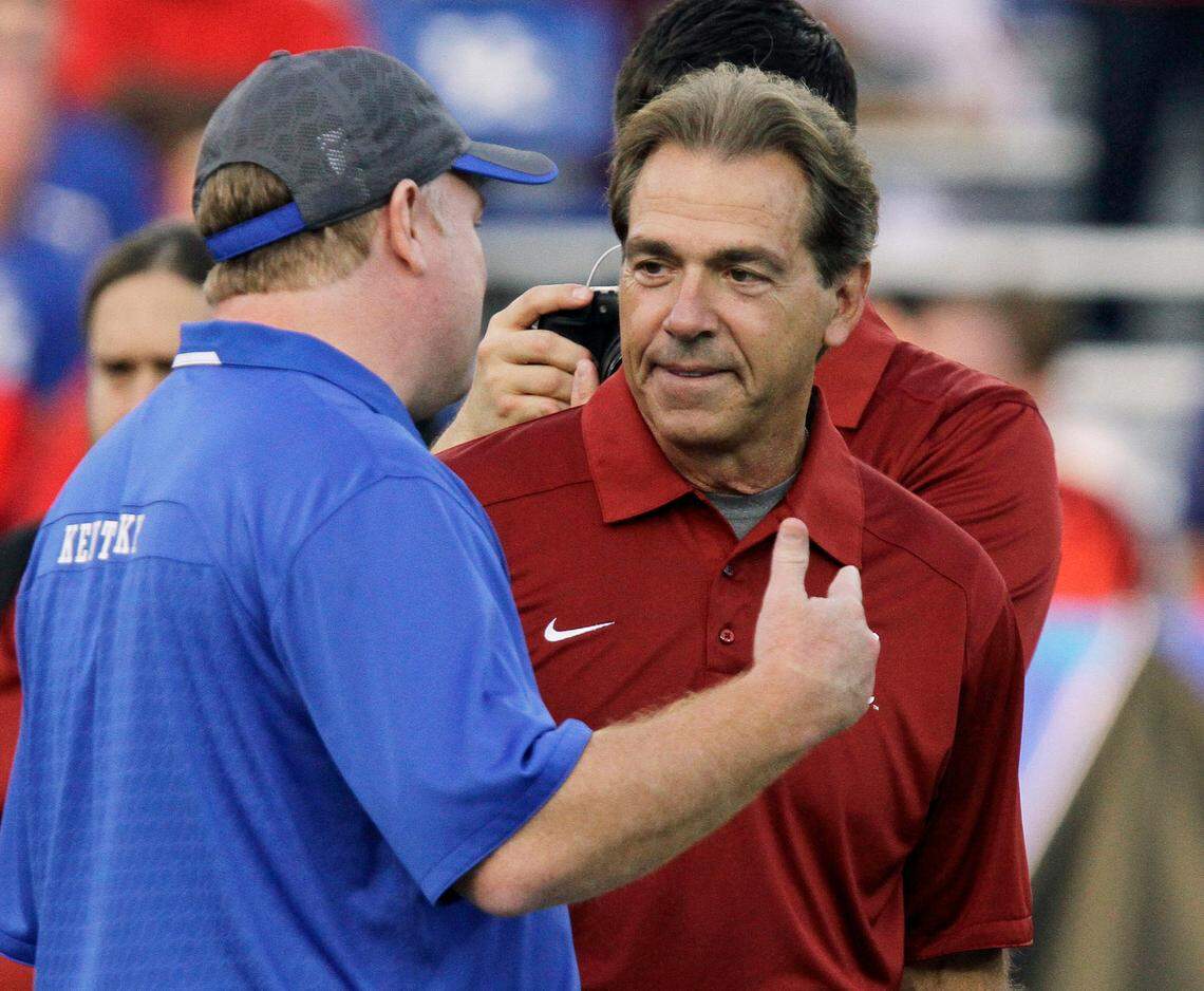 Alabama football coach Nick Saban (Crimson Tide head man since 2007), right, and Kentucky coach Mark Stoops (Wildcats head man since 2013) are the two longest-tenured coaches in the Southeastern Conference.