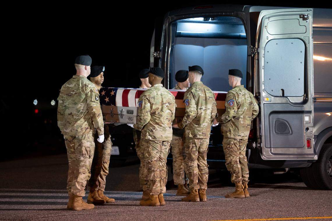 The remains of Sgt. Benjamin Pennington, of Glendale, Ky., are placed in a van during a dignified transfer ceremony at Dover Air Force Base in Dover, Del., March 9, 2026.