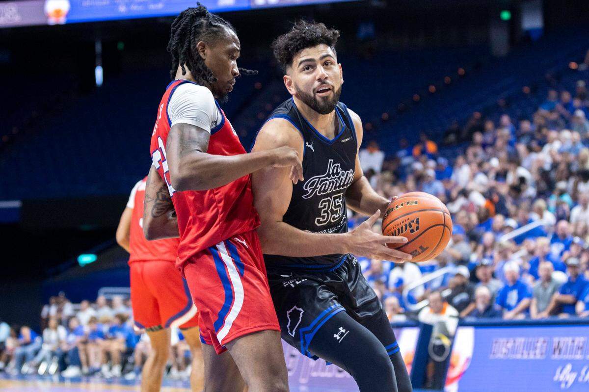 Kerem Kanter, the only member of La Familia who did not play for the University of Kentucky, led the team with 21 points in its opening-round win Friday night.