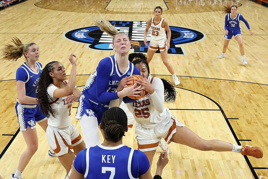 FORT WORTH, TEXAS - MARCH 28: Clara Strack #13 of the Kentucky Wildcats battles Breya Cunningham #25 of the Texas Longhorns for the ball during the second quarter in the Sweet Sixteen of the 2026 NCAA Women's Basketball Tournament at Dickies Arena on March 28, 2026 in Fort Worth, Texas. (Photo by Elsa/Getty Images)