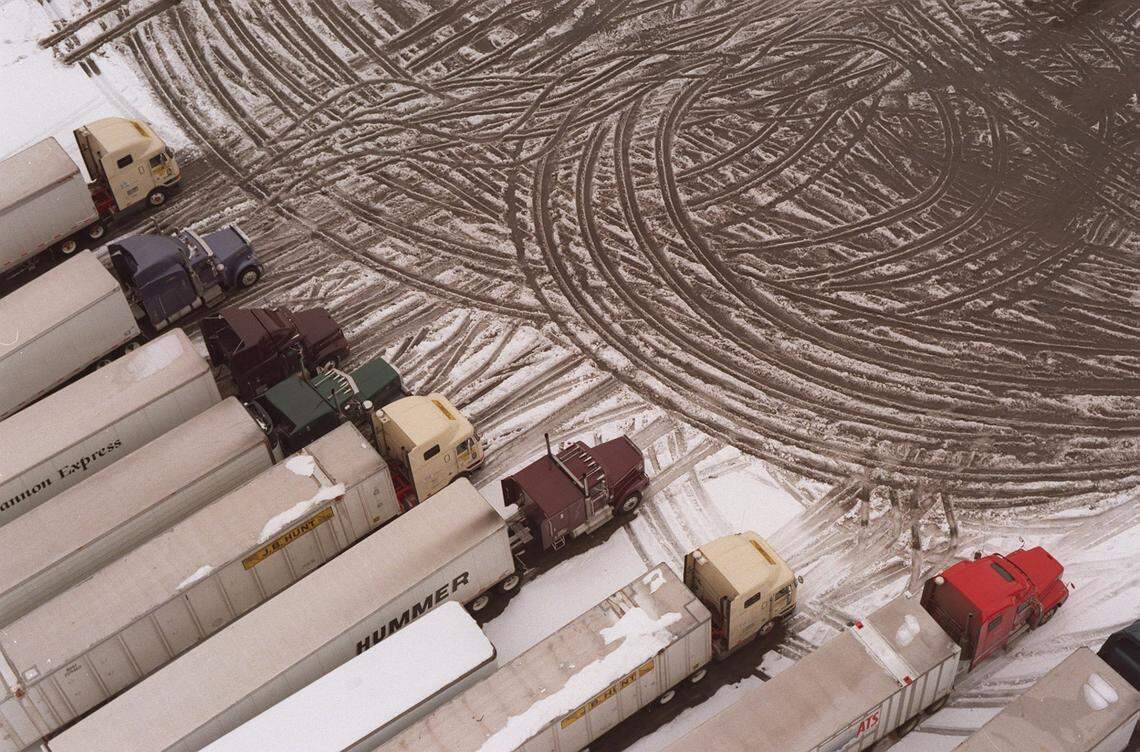 Trucks packed the Exxon Travel Center’s lot in Madison County at the Clays Ferry Interchange on I-75(in madison county) on Thursday, Feb. 5, 1998. So drivers caught in the unexpected snow storm slept in thier vechiles.