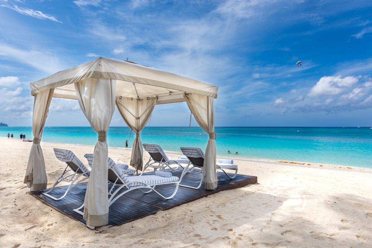 The Westin Grand Cayman Hotel offers guests a great way to relax in a beach cabana on Seven Mile Beach.