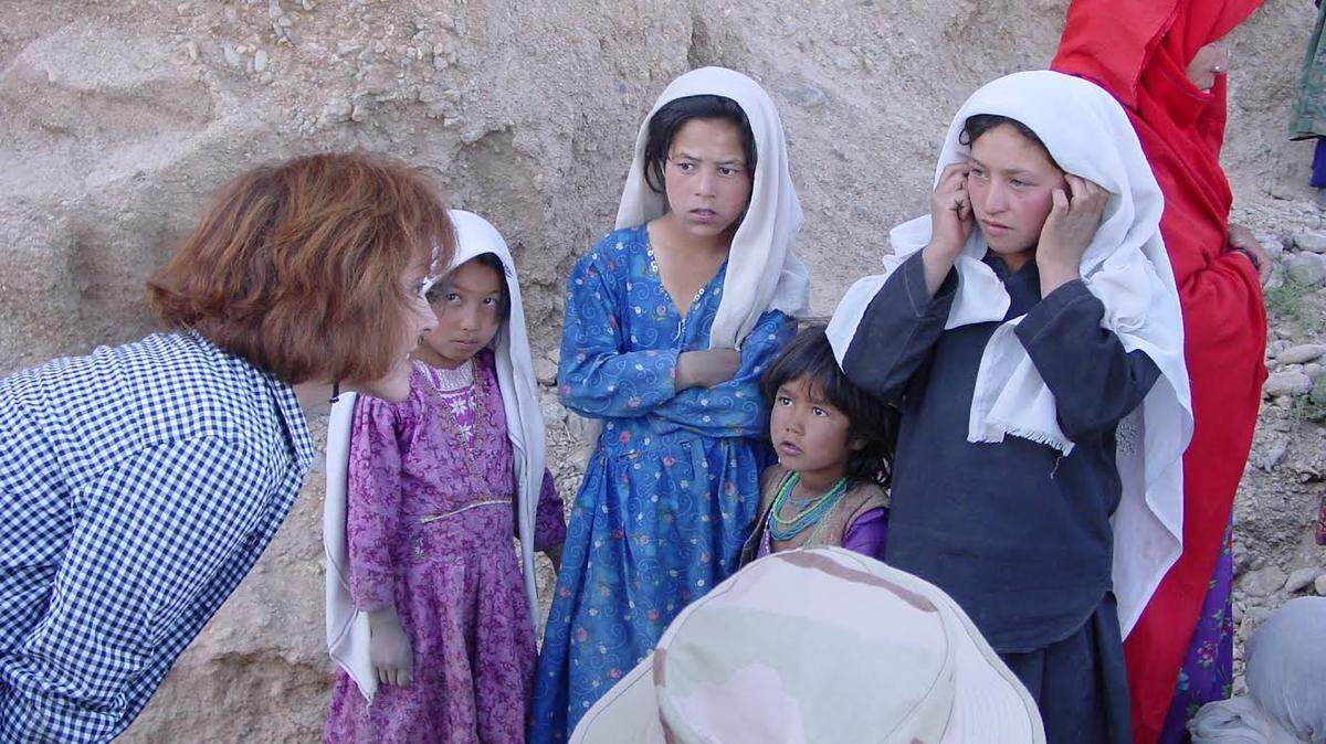 Former diplomat Deborah Alexander talked to young girls who are members of the Hazara minority in Afghanistan. Alexander worked in Afghanistan for a decade and is now helping people escape the Taliban takeover.