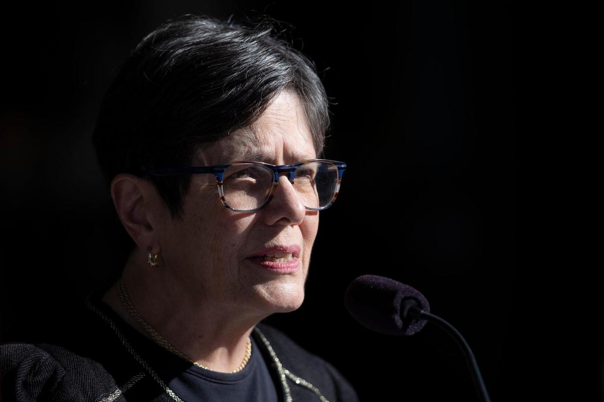 Lexington Mayor Linda Gorton speaks Friday outside the Pam Miller Downtown Arts Center in Lexington. Gorton and several members of the faith community held a memorial in honor of the 109 people who have lost their lives to the coronavirus since the start of the pandemic.