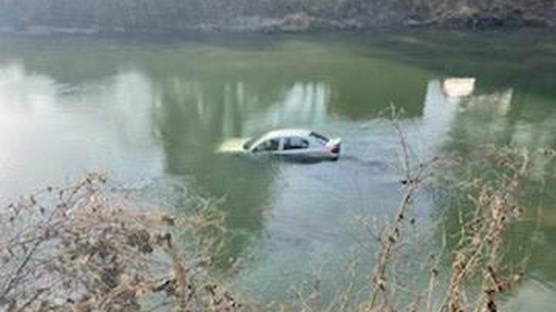 A Kentucky Power lineman saved a woman whose car was sinking in a river.