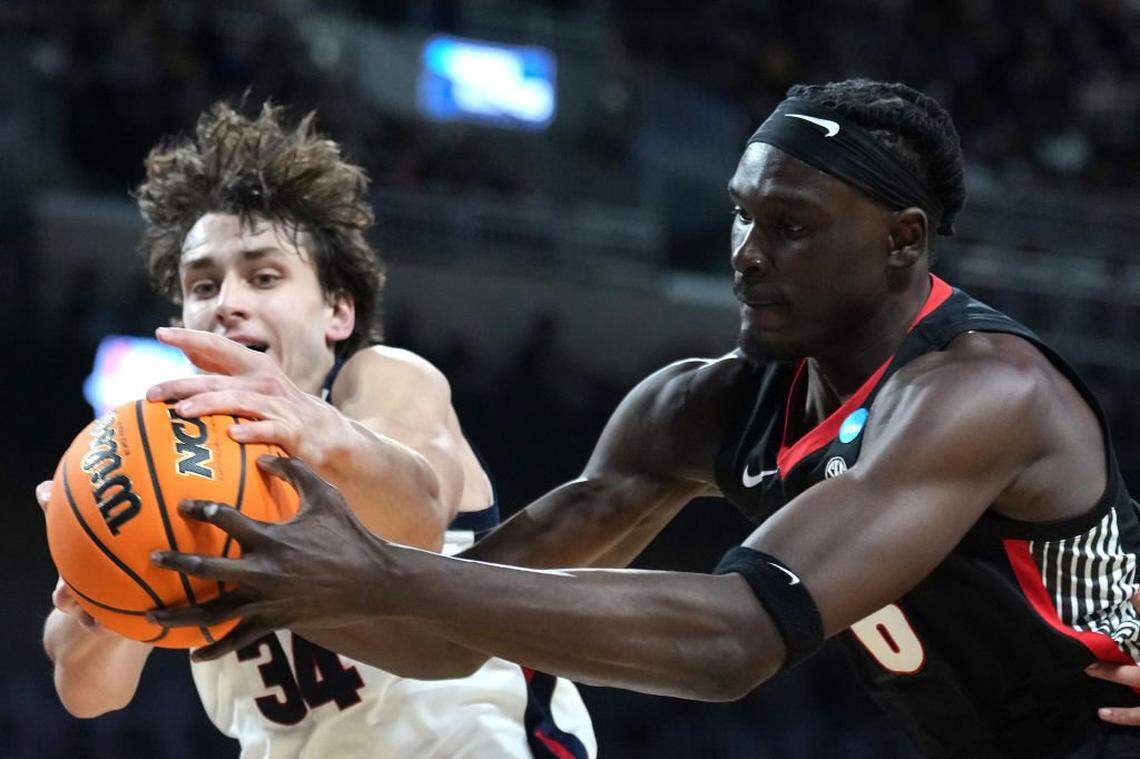WICHITA, KANSAS - MARCH 20: Somto Cyril #6 of the Georgia Bulldogs battles for a rebound against Braden Huff #34 of the Gonzaga Bulldogs during the first half in the first round of the NCAA Men's Basketball Tournament at INTRUST Arena on March 20, 2025 in Wichita, Kansas.  (Photo by Jamie Squire/Getty Images)