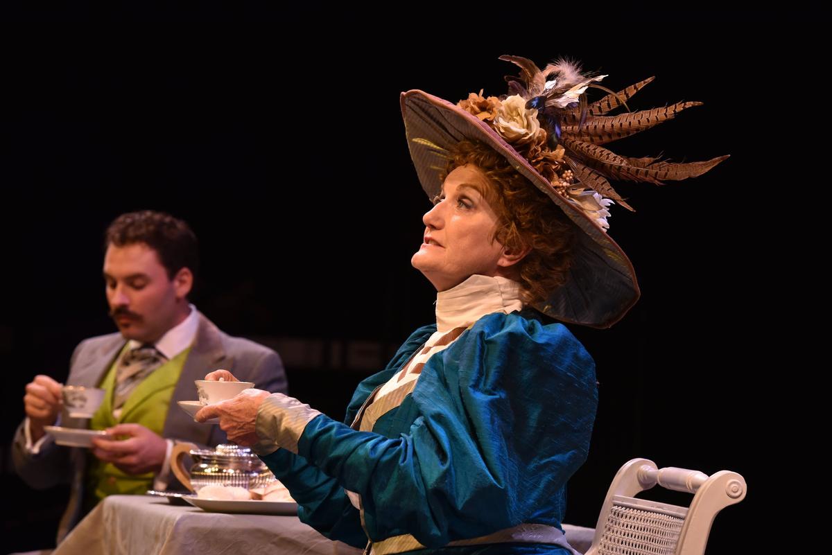 Mark Mozingo as Algernon and Janet Scott as Lady Bracknell in AthensWest Theatre Company’s production of Oscar Wilde’s “The Importance of Being Earnest.”