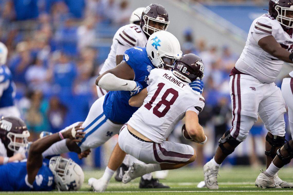 Kentucky defensive tackle Deone Walker sacks Eastern Kentucky quarterback Parker McKinney (18) during UK’s 28-17 win over EKU last week.