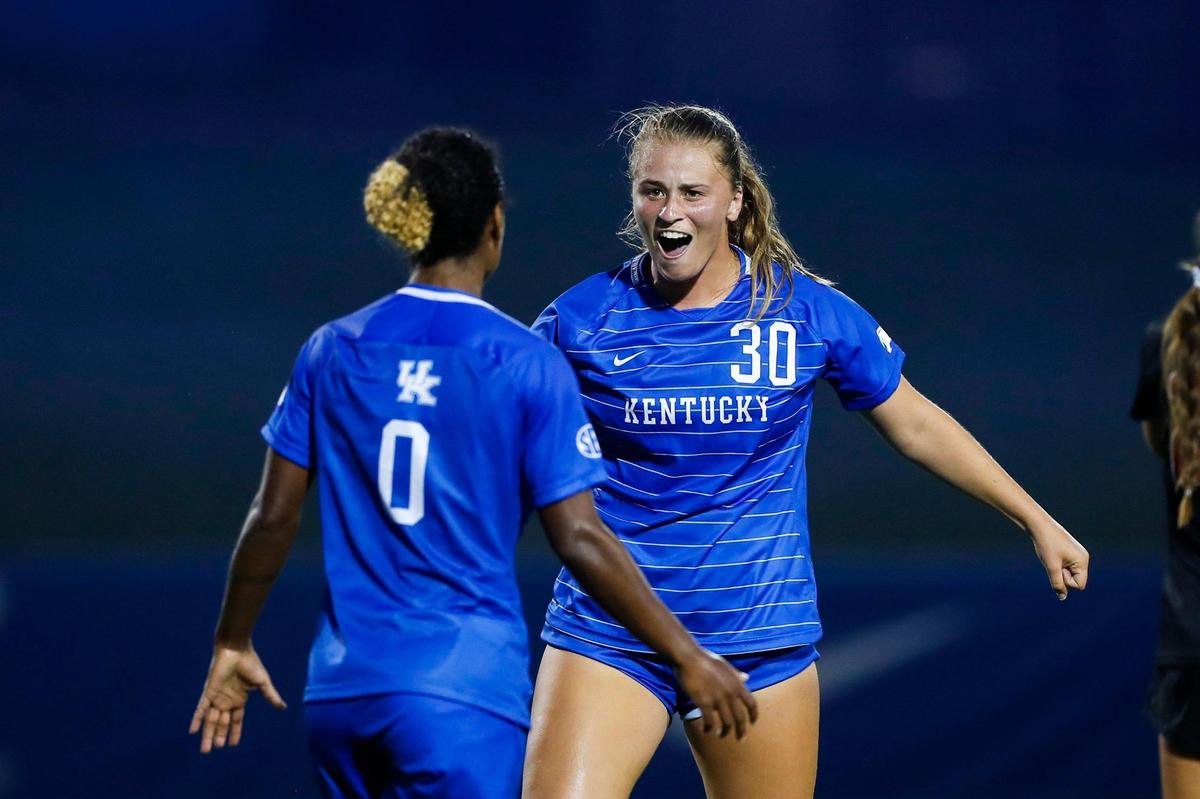 Kentucky senior forward Jordyn Rhodes (30) celebrates scoring a goal against Ball State with teammate Hailey Farrington-Bentil. Rhodes is one of 15 holdovers from last year’s team. Farrington-Bentil is one of UK’s 17 newcomers.