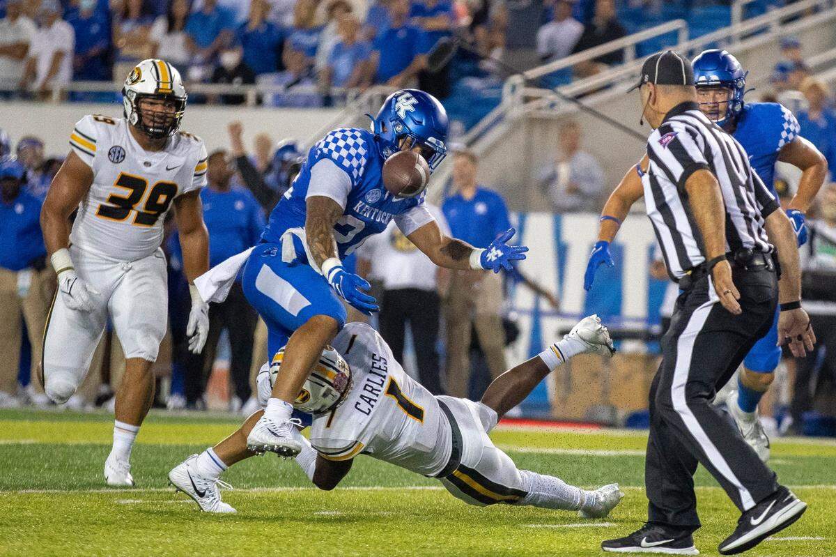 Missouri safety Jaylon Carlies (1) forces a Christopher Rodriguez fumble during Missouri’s 35-28 loss to Kentucky last season at Kroger Field. Carlies leads Mizzou in tackles in 2022 with 38.