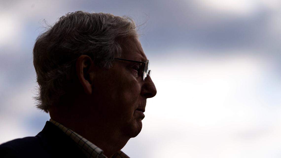 Senate Majority Leader Mitch McConnell speaks with reporters after casting his ballot during early voting at the Kentucky Exposition Center in Louisville, Ky., Thursday, October 15, 2020.