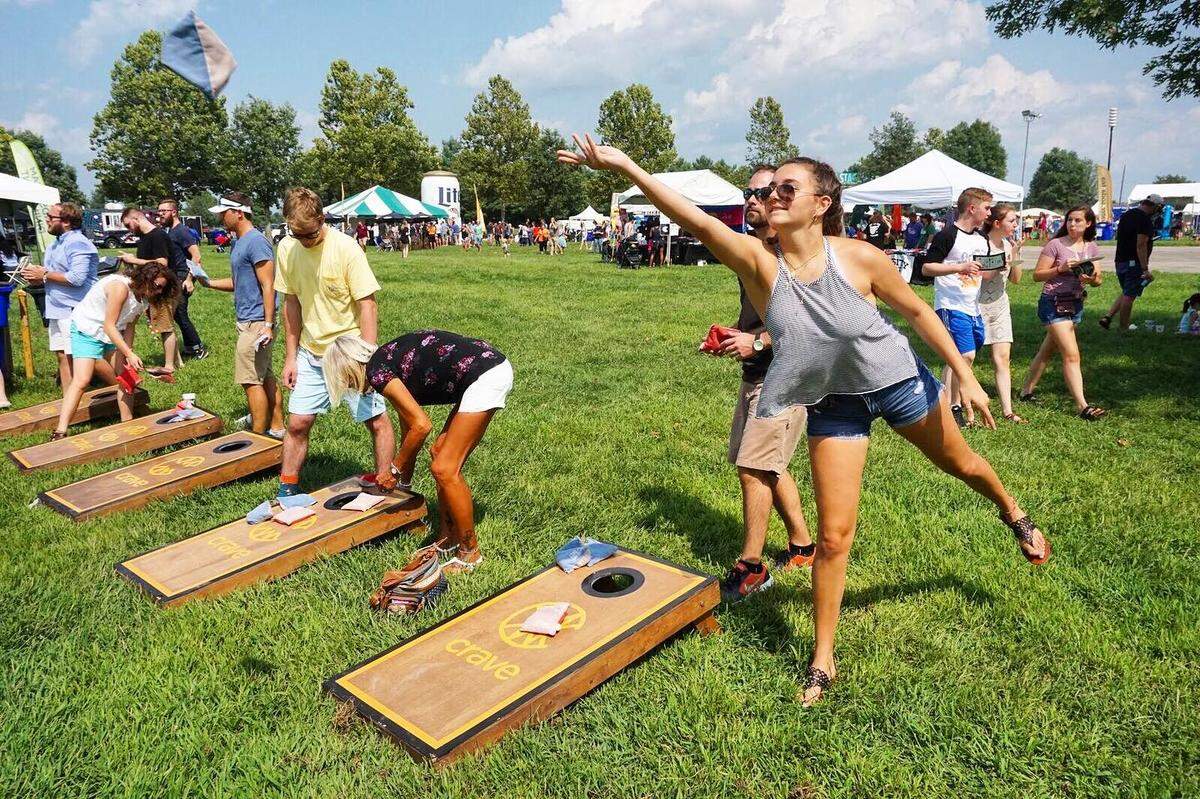 Friends and family can play cornhole, as well as other activities at CRAVE.