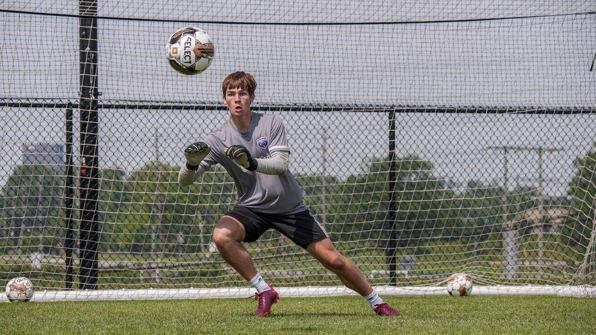 Goalkeeper Alex Kron, a senior at St. Xavier High School in Louisville, recently signed a USL Academy contract with Louisville City FC, which allows him to practice and play with the pro soccer team while maintaining his amateur status. Kron will begin his college career at the University of Kentucky this fall.
