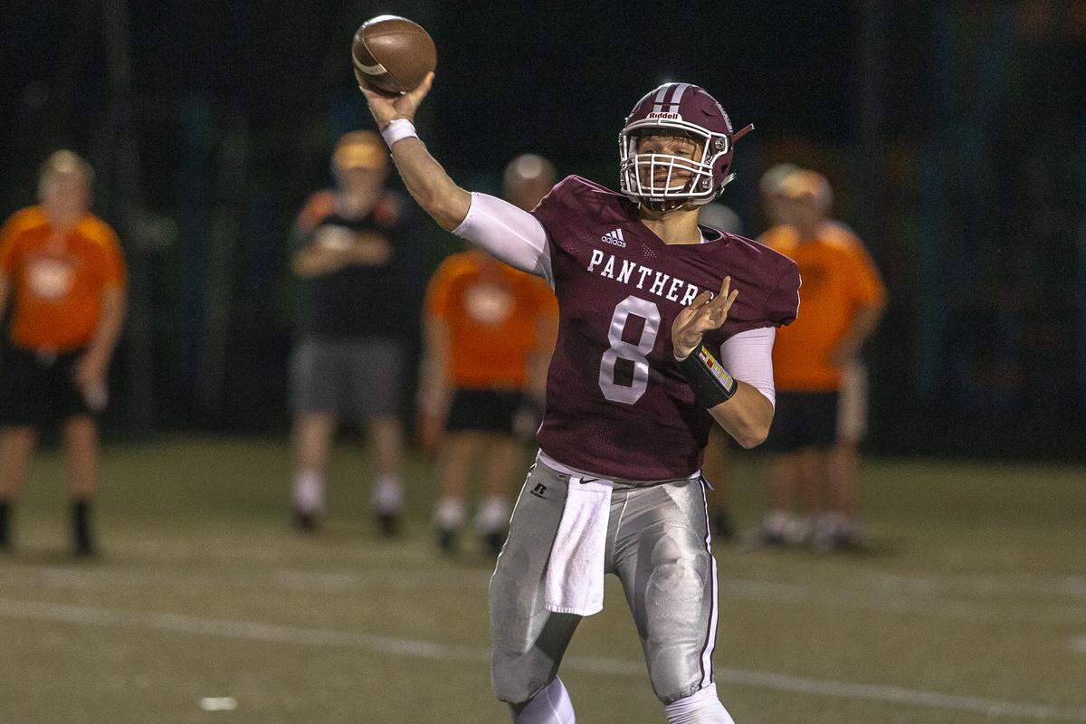 Pikeville quarterback Isaac McNamee (8) passes the ball.