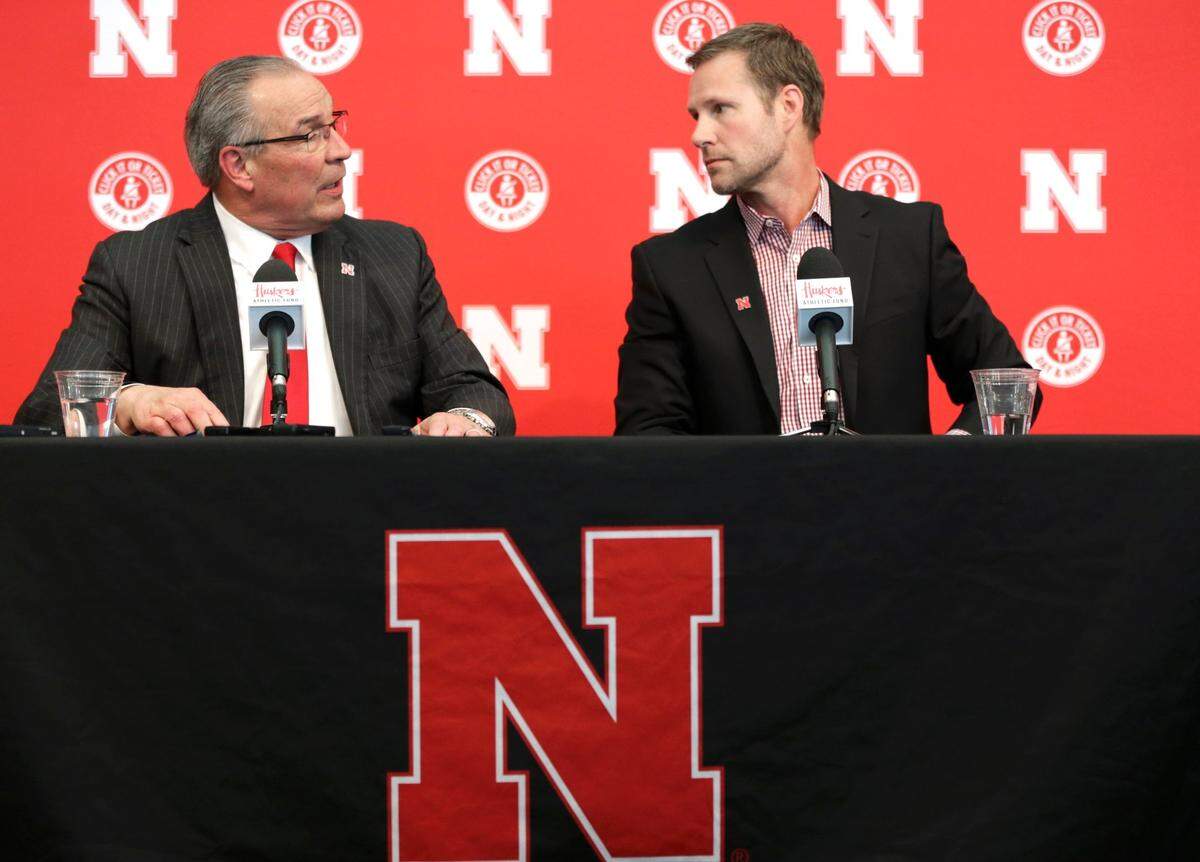 Nebraska Athletics Director Bill Moos, left, used a seven-year, $25 million contract to woo former Iowa State and Chicago Bulls head coach Fred Hoiberg to the Cornhuskers.