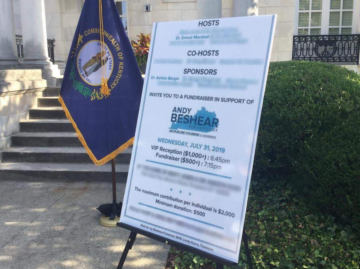 Gov. Matt Bevin displayed Friday, Aug. 1, 2019, at a news conference outside the Governor’s Mansion a copy of a fundraiser invitation for Democrat Andy Beshear’s campaign for governor from doctors who perform abortions at Kentucky’s sole abortion clinic, EMW Women’s Surgical Center in Louisville.