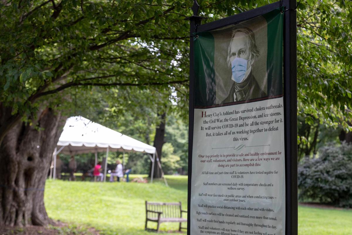 A sign at Ashland depicts Henry Clay wearing a modern surgical mask in Lexington, Ky., Wednesday, August, 2020. Museums in Kentucky were allowed to reopen on June 8. The estate reopened with mask requirements and social distance rules during tours.