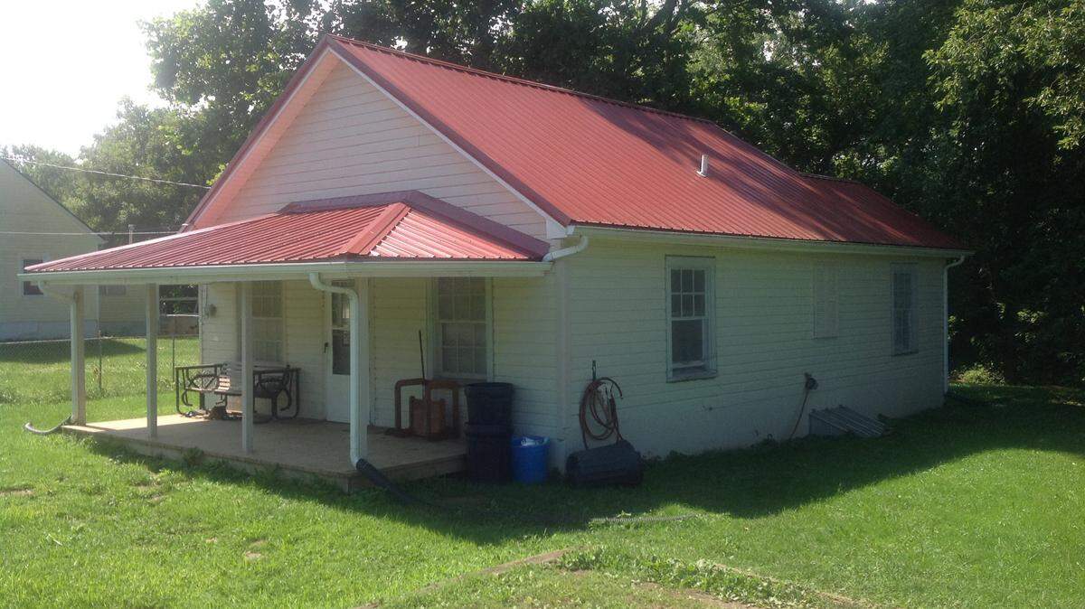 According to a lawsuit filed in May against Scott County farmers Gene and Austin McKenzie by eight Mexican farm workers, this house in Stamping Ground is where some of the workers were assigned to live by the McKenzies in 2013. The lawsuit alleges many complaints, among them that the houses were not fit for occupancy, because of broken plumbing, little to no furniture, rats and insects, a lack of heat and no window screens. Photo by John Cheves | Staff