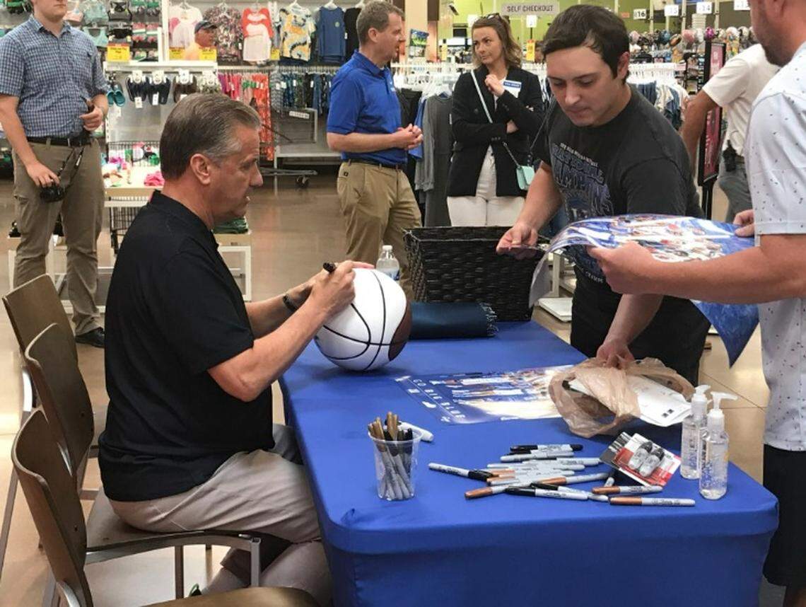 Kentucky basketball coach John Calipari signed autographs at the Kroger on Marketplace Circle in Georgetown on Thursday.