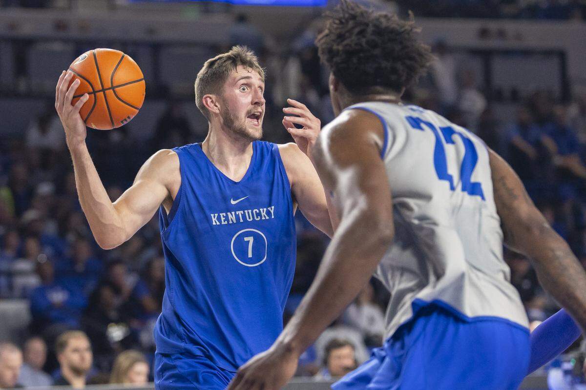 Kentucky forward Andrew Carr looks to pass the ball during the Blue-White Preseason Event in Memorial Coliseum on Friday night.