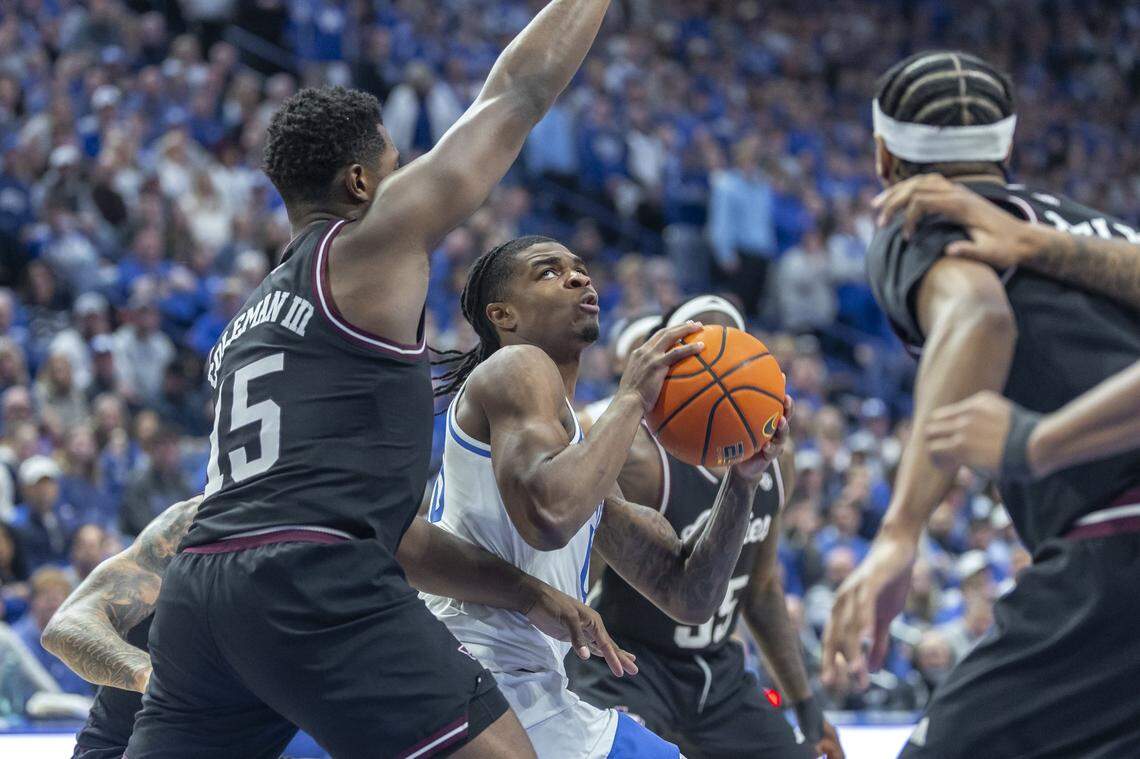 Kentucky’s Otega Oweh (00) looks to shoot against Texas A&M defender Henry Coleman III (15) on Tuesday night.