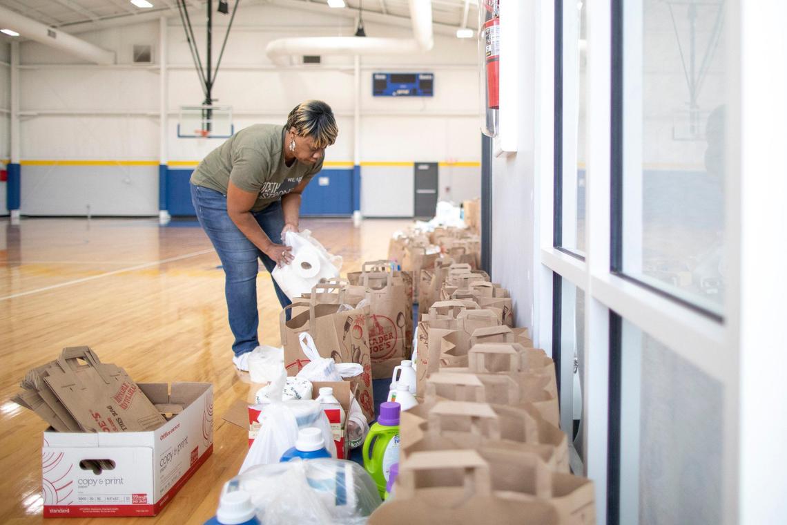 Sandra Ballew-Barnes, Breckinridge Elementary School Family Resource Center director, prepared bags of supplies for students’ families at the Woodhill Community Center in Lexington.