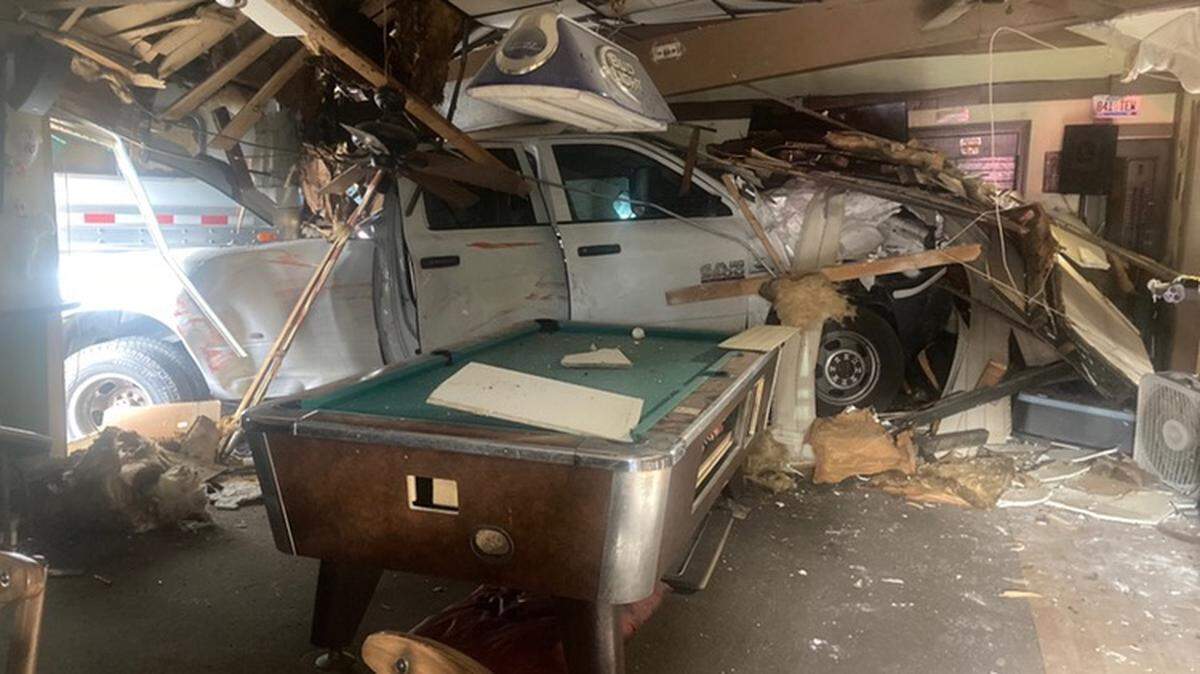 A crew cab dually truck pulling a 30-foot gooseneck horse trailer loaded with four horses drove into the Curbside Bar at 2314 Paris Pike Saturday afternoon.