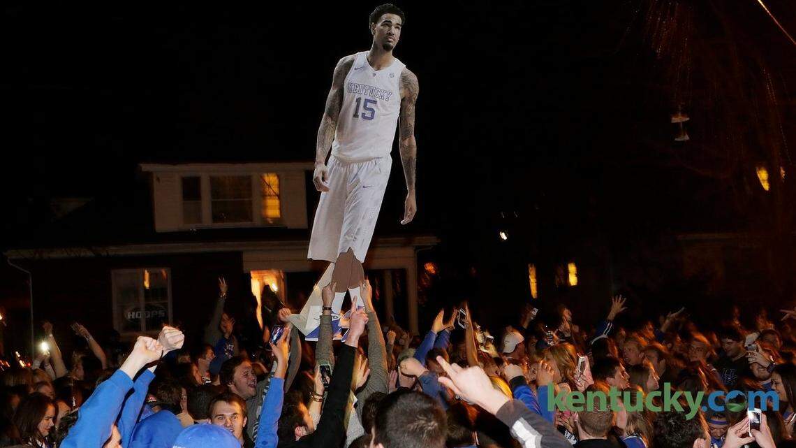 A large cardboard cutout of Kentucky star Willie Cauley-Stein was carried around over the crowd Saturday night on State Street after Kentucky's victory over Notre Dame. 