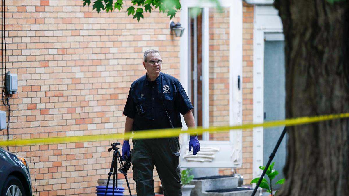 Police and Fayette County coroner on the scene of a triple homicide off of Caywood and Alexandria Drives in Lexington, Ky., Wednesday, May 25, 2022.