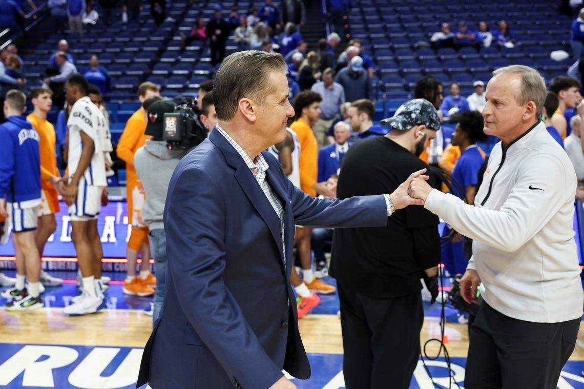 Kentucky head coach John Calipari meets Tennessee head coach Rick Barnes on the court after the Volunteers’ win Saturday at Rupp Arena.