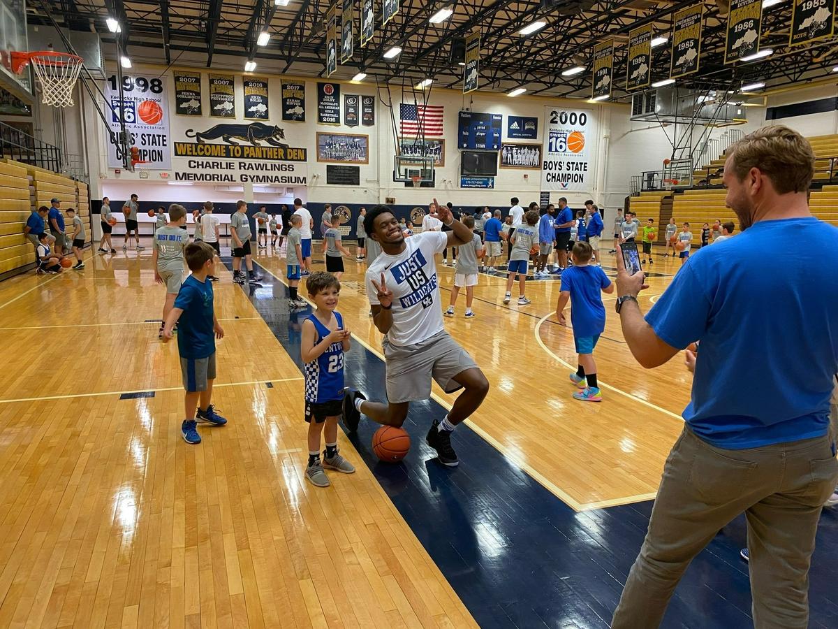 Kentucky junior forward Keion Brooks posed for a photo with a camper during UK’s satellite camp at Elizabethtown High School last summer. The Fort Wayne, Ind., product will be a John Calipari-era rarity this winter: A third-year UK player.