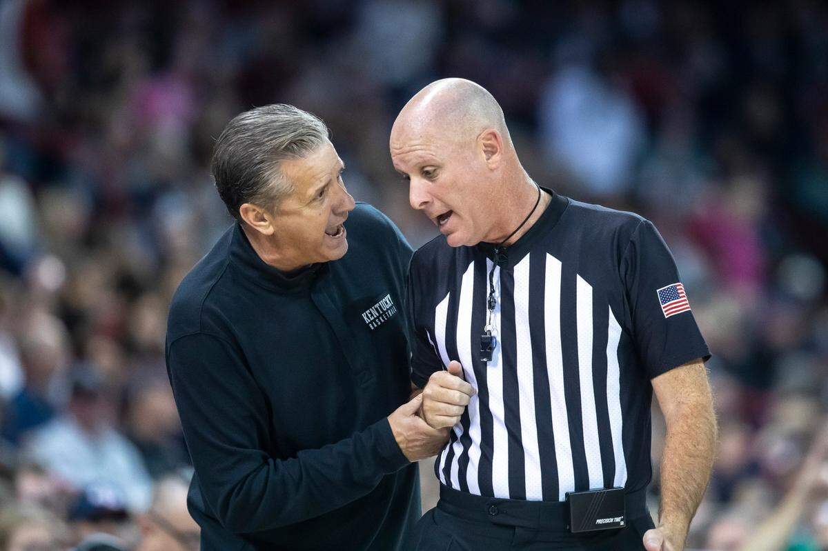 John Calipari talks to a referee during Sunday night’s loss to Gonzaga. Kentucky’s head coach said a lack of preparation time hurt the Wildcats.