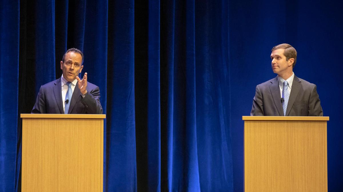 Kentucky Gov. Matt Bevin, Republican candidate for governor, left, and Kentucky Attorney General Andy Beshear, Democratic candidate for Kentucky governor, participate in a debate at the Singletary Center for the Arts on the University of Kentucky campus in Lexington, Ky., Tuesday, Oct. 15, 2019.