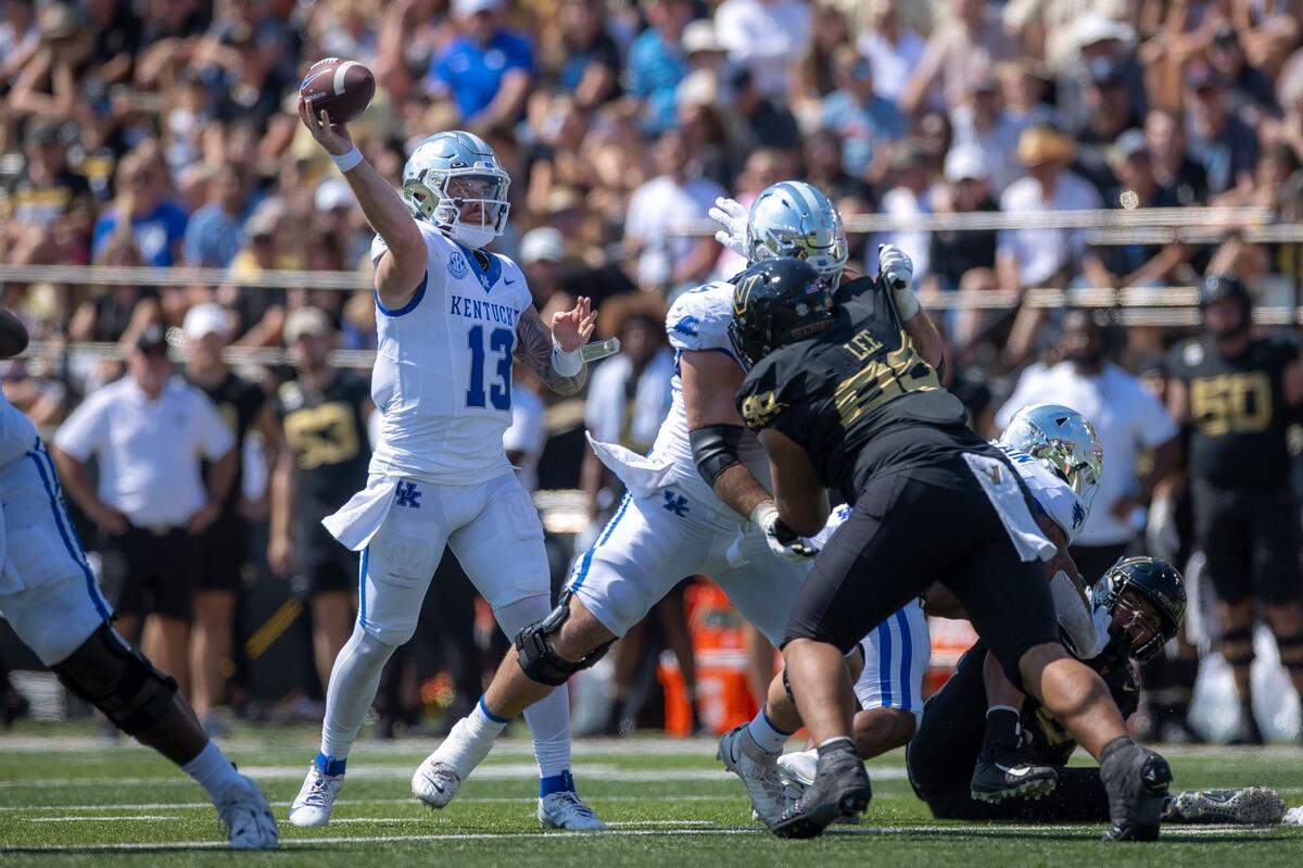 Kentucky quarterback Devin Leary (13) completed 15 of 29 passes for 205 yards and one touchdown with two interceptions Saturday at Vanderbilt.
