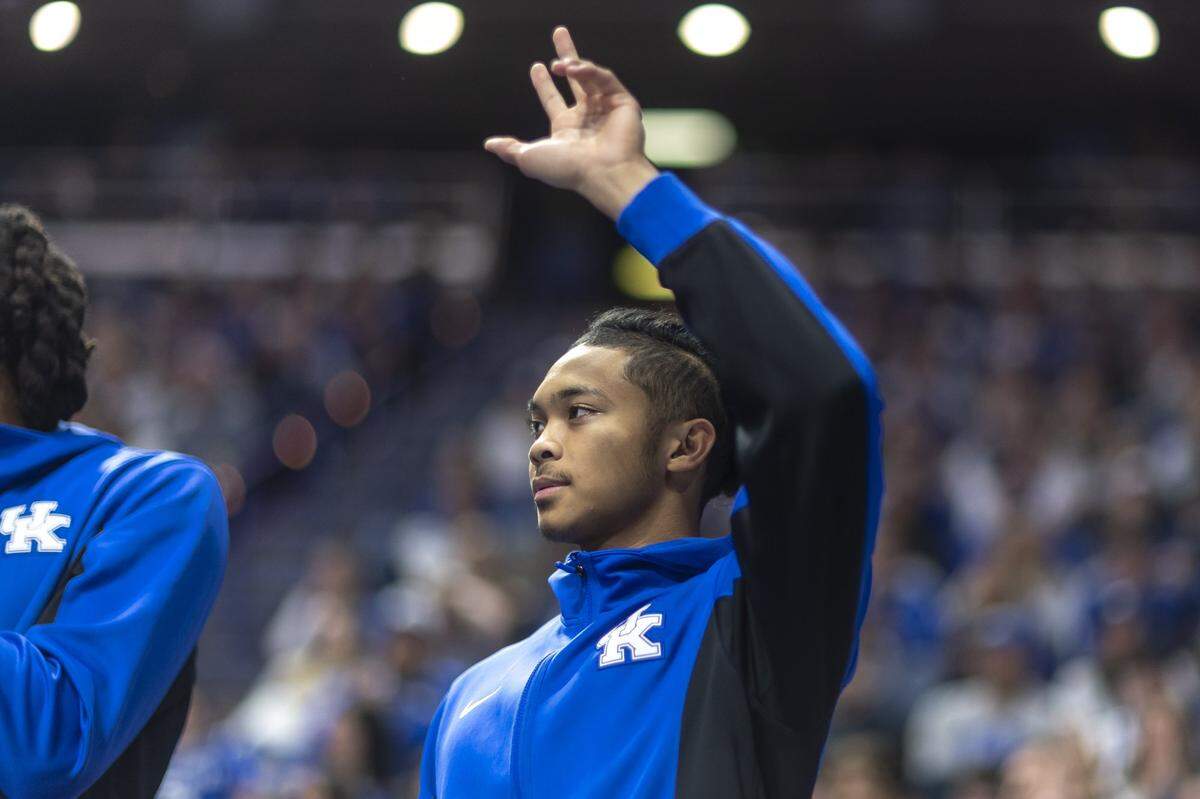 Kentucky guard Jaland Lowe cheers during Friday’s game against Eastern Illinois at Rupp Arena.