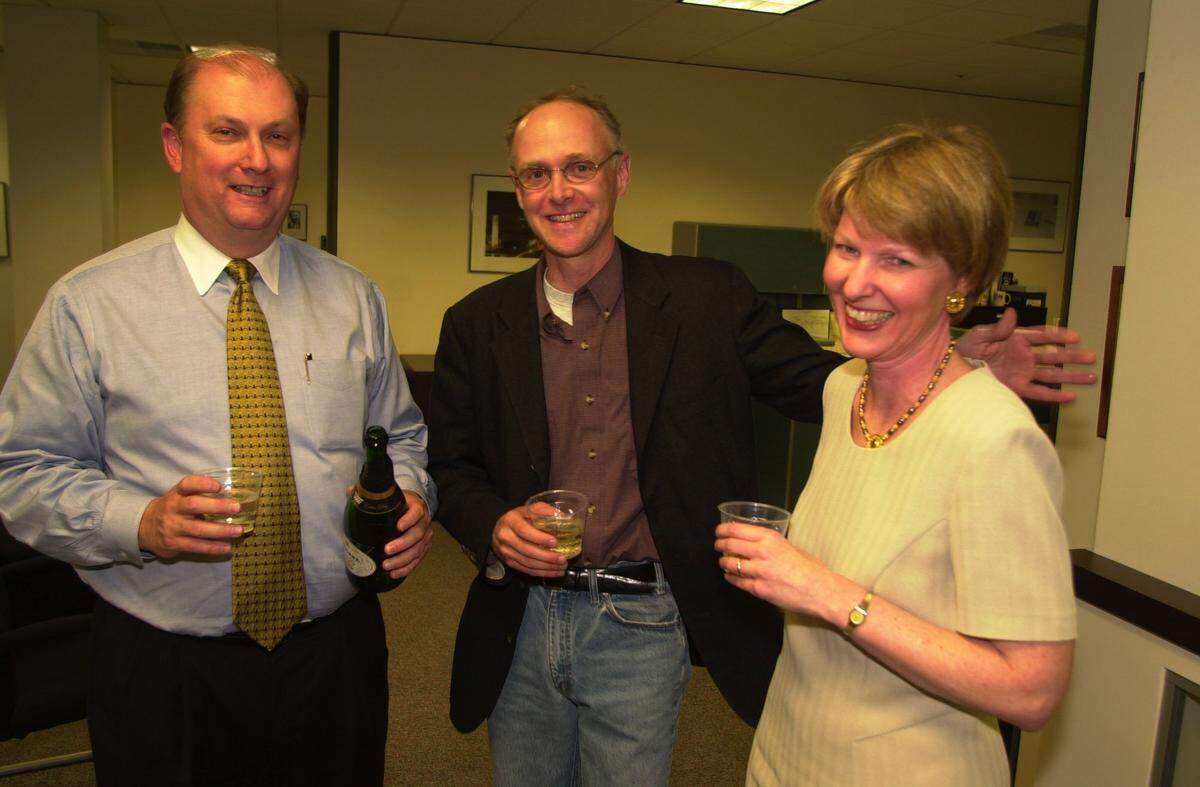 Lexington Herald Leader Publisher Tim Kelly, left, editorial cartoonist Joel Pett,center and Editor and Vice President Pam Luecke congratulate Pett on winning the Pulitzer Prize for editorial cartoons on April 10 , 2000 in Lexington ,Ky.