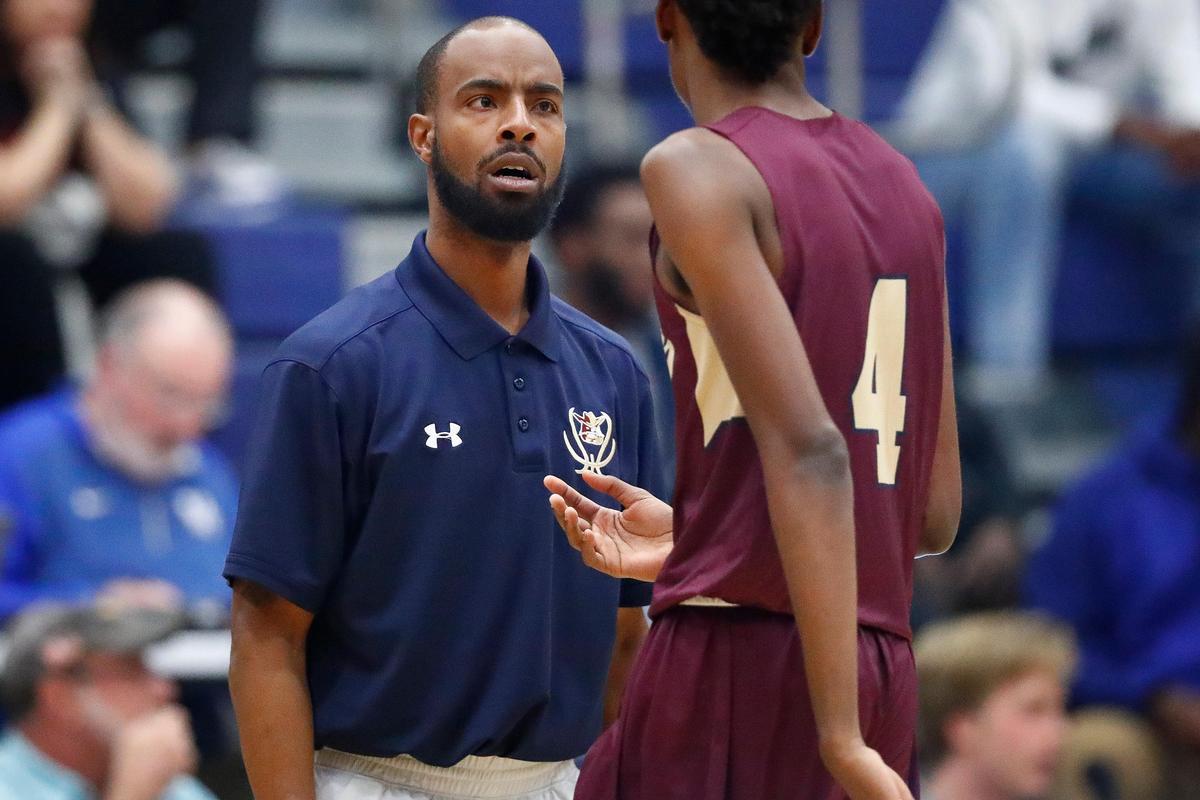 Bourbon County head coach Lamont Campbell spoke with Amari Faulkner (4). “These guys are excited to represent Bourbon County,” Campbell said.