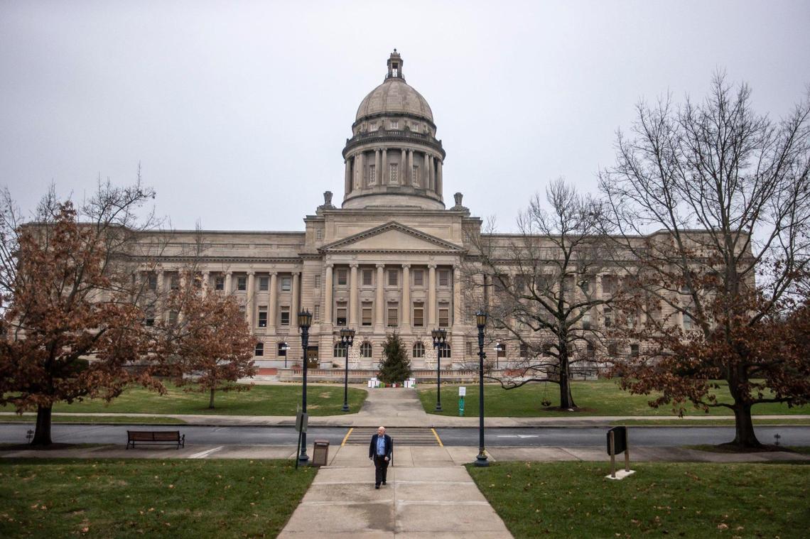 Longtime Lexington Herald-Leader Capitol Bureau Chief Jack Brammer walks to the Capitol Annex on the grounds of the Kentucky state Capitol in Frankfort, Ky., on Wednesday, Dec. 29, 2021.