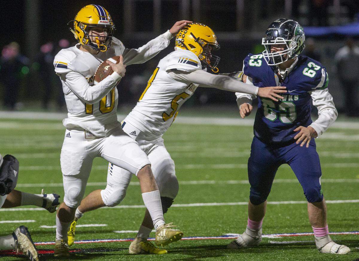 Franklin County’s Nick Broyles (10) scrambles during the first half of their game at Great Crossing High School on Friday, Nov. 1, 2019.
