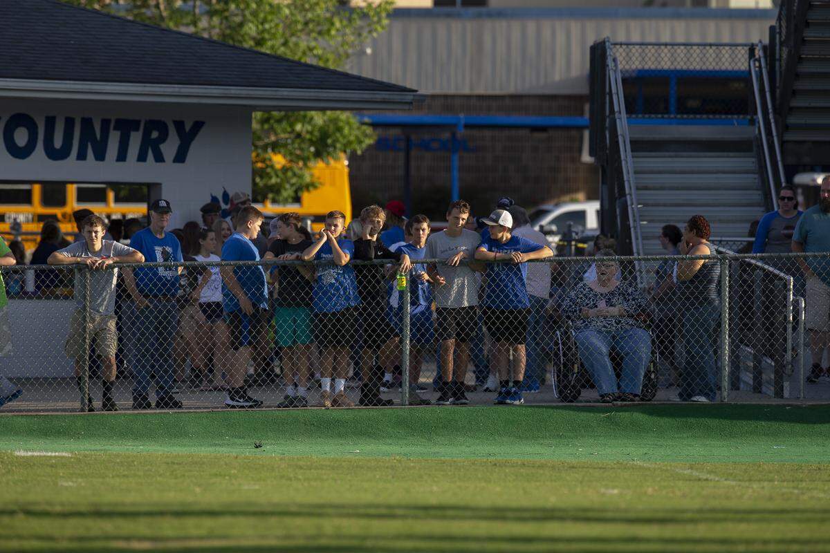 Spectators watch as the Bobcats warm up Friday, Aug. 30.